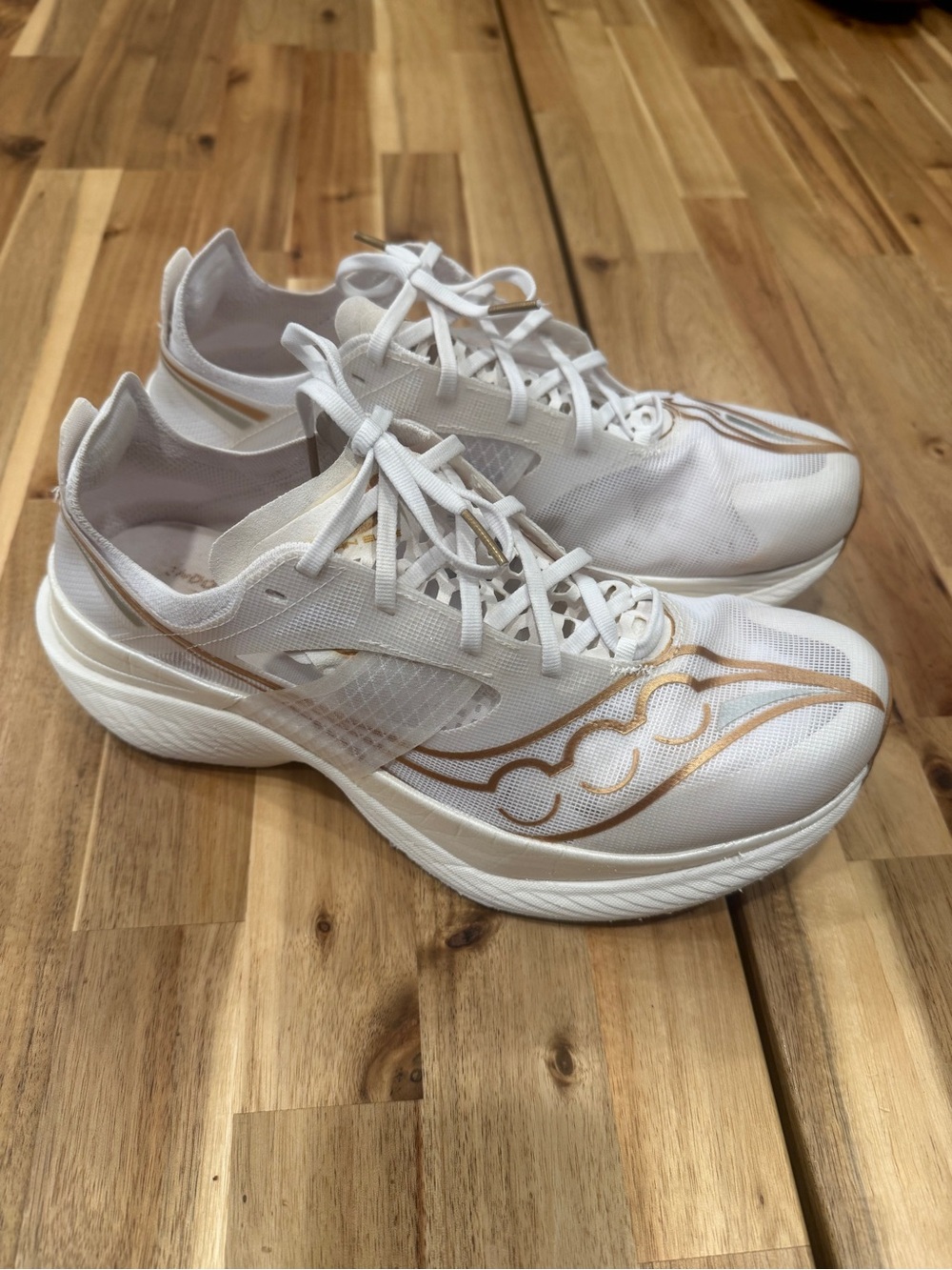 Men’s White and Gold Saucony Endorphin Elite running shoes